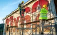 Numbers on side of building with scaffold