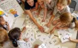 Children with phonics cards
