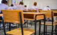 Empty chair in classroom