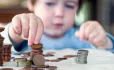 Small child counting money
