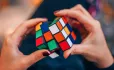 Woman solving rubik's cube