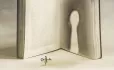 Girl with key to a book