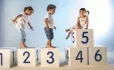 Children climbing on blocks