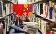 Reading books in library