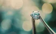 Tweezers holding a diamond