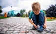 Boy tying shoe laces