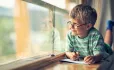School boy at window
