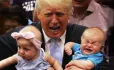 Donald Trump, Holding A Bawling Baby In His Arms, & Appearing To Bawl Himself