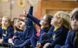Primary Children In An Assembly – Coronavirus Teacher Year