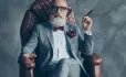 Life Lessons: Elderly Gentleman, Sitting In Leather Armchair & Smoking Cigar